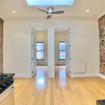 Rent this 4 bed apartment on 426 West 52nd Street in New York, NY 10019