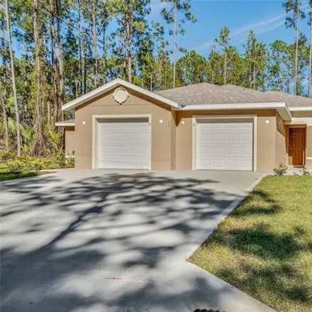 Rent this 3 bed house on 57 Pony Express Drive in Palm Coast, FL 32164