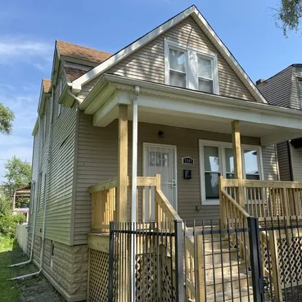 Buy this 4 bed house on 9145 South Woodlawn Avenue in Chicago, IL 60619