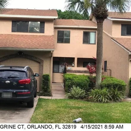 Rent this 3 bed townhouse on Peregrine Court in Orlando, FL 32819