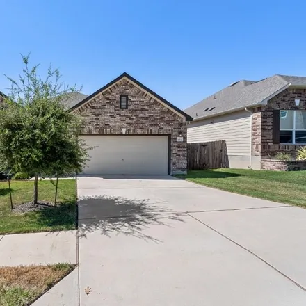 Rent this 4 bed house on 7620 Peccary Drive in Austin, TX 78744