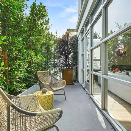 Rent this 4 bed apartment on 1241 North Clark Street in Los Angeles, CA 90069