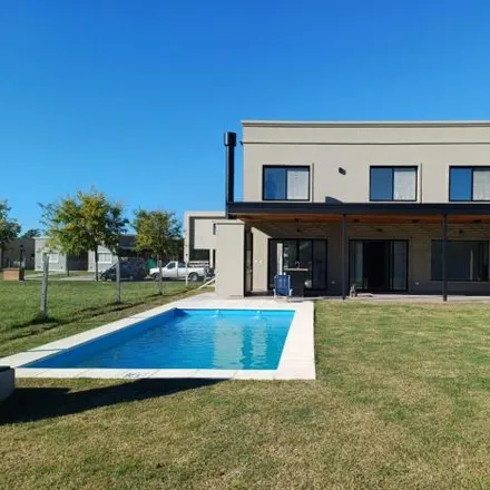 Rent this 4 bed house on Jujuy in Partido del Pilar, B1629 XAA Fátima