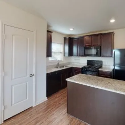 Rent this 4 bed apartment on 4231 Calla Drive in Heather Hollow-Windmill Farms, Forney