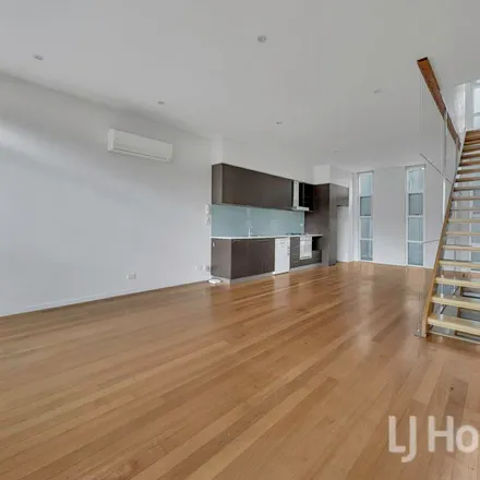 Rent this 3 bed townhouse on 22-24 Munster Terrace in North Melbourne VIC 3051, Australia