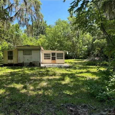 Buy this studio apartment on 3839 County Road 405 North in Sumter County, FL 33538