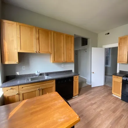 Rent this 3 bed apartment on 2159 W Chicago Ave