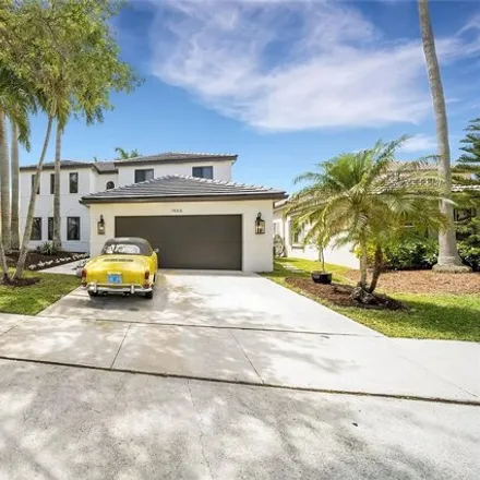 Rent this 6 bed house on 1466 Meadows Boulevard in Weston, FL 33327