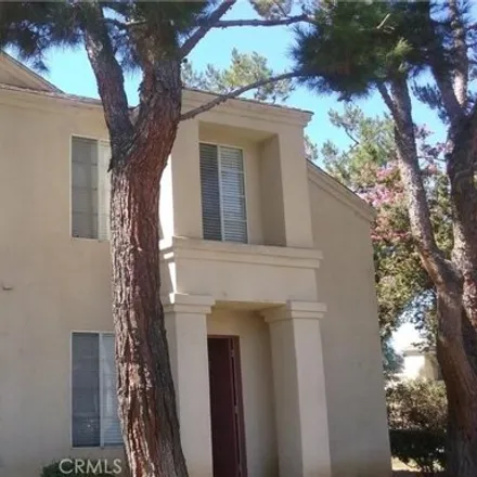 Rent this 2 bed townhouse on 22421 Terrace Pines Drive in Grand Terrace, CA 92313