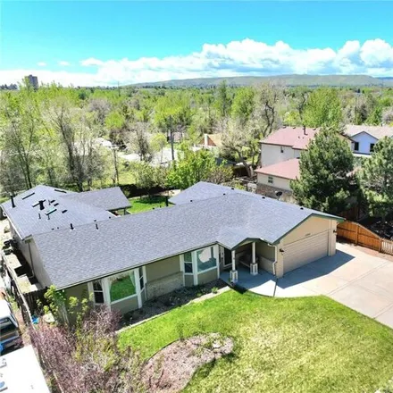 Buy this 4 bed house on 11886 West Security Avenue in Lakewood, CO 80401