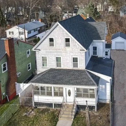 Buy this 6 bed house on 66 Garfield Avenue in Boston, MA 02136