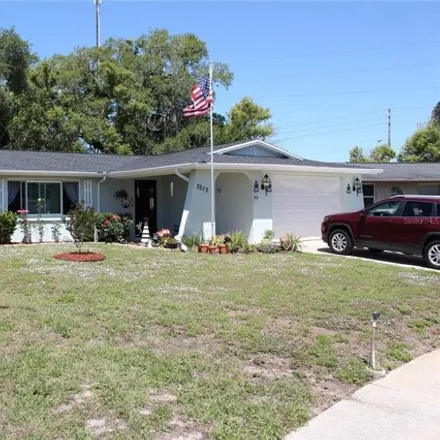 Buy this 3 bed house on 3187 Custer Drive in Elfers, FL 34690