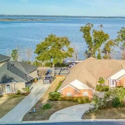 Buy this 4 bed house on 3078 Pelican Lane in Pensacola, FL 32514