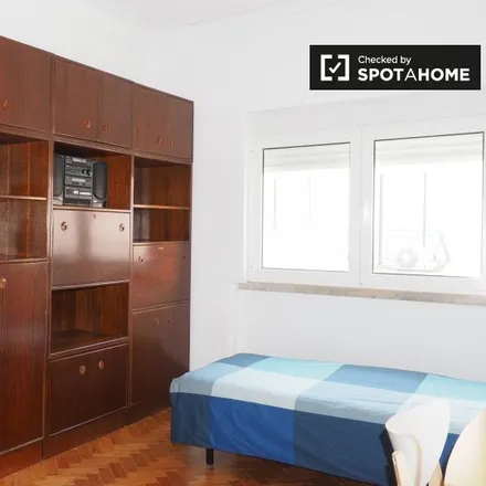 Rent this 4 bed room on Rua da Beneficência (Rego) in Rua Portugal Durão, 1600-021 Lisbon