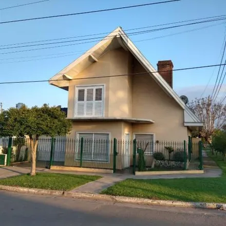 Buy this 4 bed house on Cabildo de Buenos Aires in Partido de Florencio Varela, B1888 EEE Villa Vatteone
