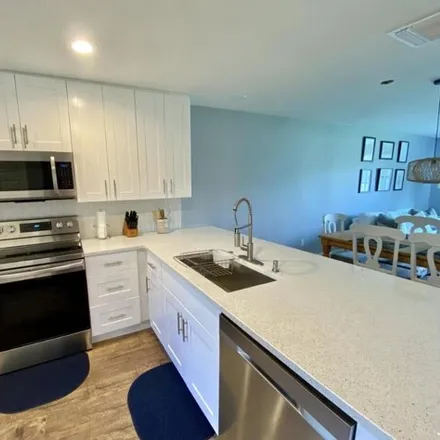 Rent this 3 bed condo on 13055 Albright Ct Apt 17 in Wellington, Florida