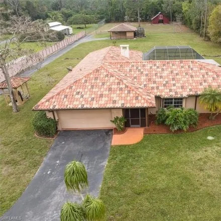 Buy this 4 bed house on 6004 Copper Leaf Lane in Collier County, FL 34116