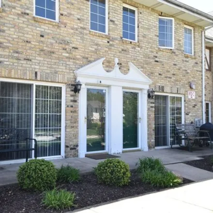 Buy this 2 bed townhouse on 325 West Aspen Drive in Oak Creek, WI 53154