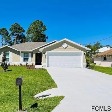 Rent this 3 bed house on 74 Princess Rose Drive in Palm Coast, FL 32164
