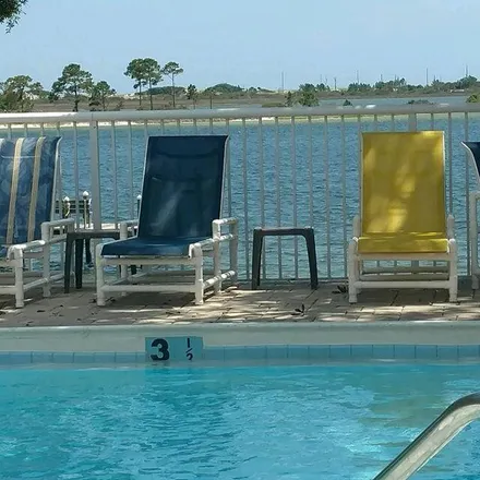Buy this 1 bed condo on 209 West Miracle Strip Parkway in Mary Esther, Okaloosa County