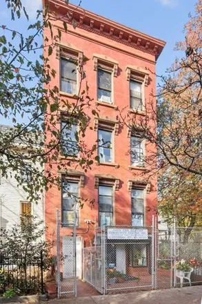 Buy this 8 bed house on 14 Stuyvesant Avenue in New York, NY 11206