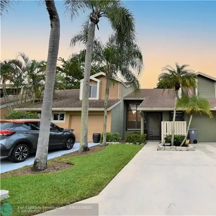 Buy this 3 bed townhouse on 22408 Thousand Pines Lane in Palm Beach County, FL 33428