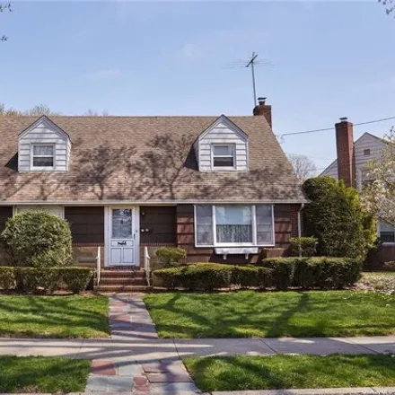 Buy this 4 bed house on 77 Floral Parkway in Village of Floral Park, NY 11001