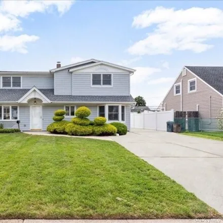 Buy this 3 bed house on 28 Harvest Ln in Levittown, New York