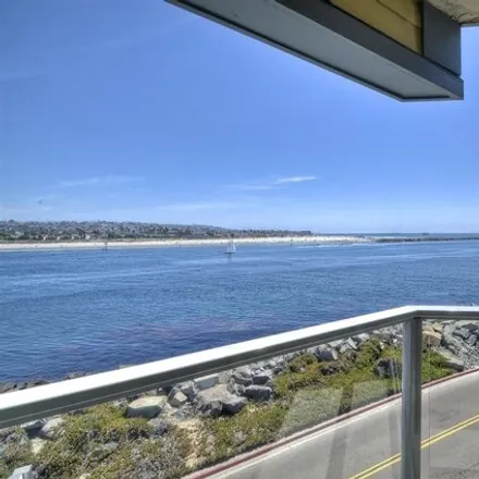 Rent this 4 bed condo on 2595 Ocean Front Walk in San Diego, CA 92109