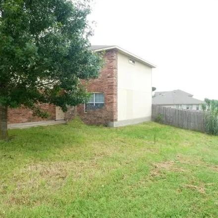 Buy this 4 bed house on 18337 Crestwind Cove in Elgin, TX 78621