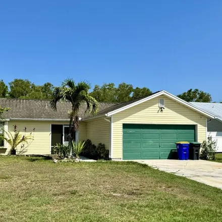 Buy this 3 bed house on 6693 Southeast Amyris Court in Martin County, FL 34997