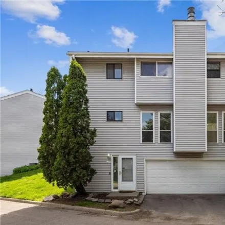Buy this 3 bed townhouse on 6609 Camden Dr in Brooklyn Center, Minnesota