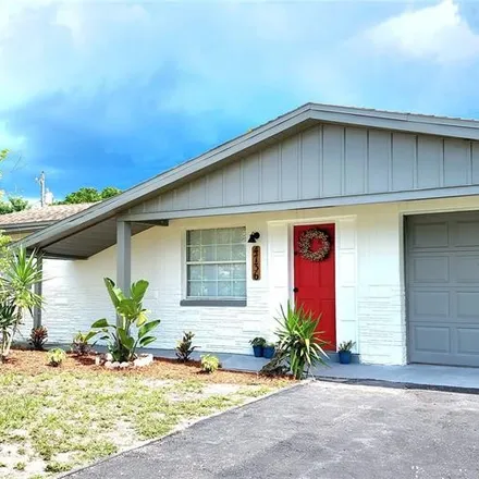 Buy this 3 bed house on 4726 Blossom Drive in Holiday, FL 34690