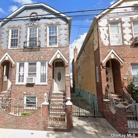 Buy this 8 bed house on 667 East 91st Street in New York, NY 11236