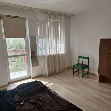 Rent this 1 bed apartment on Wielicka 73 in 30-552 Krakow, Poland