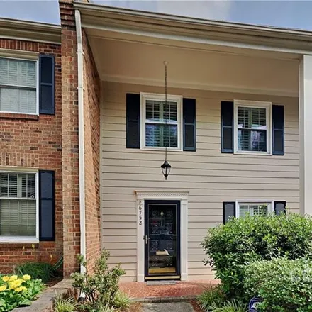 Buy this 4 bed townhouse on 6752 Constitution Lane in Olde Georgetowne, Charlotte