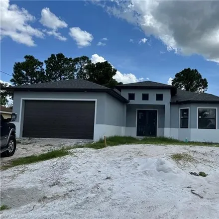 Buy this 4 bed house on 3719 36th Street Southwest in Lehigh Acres, FL 33976