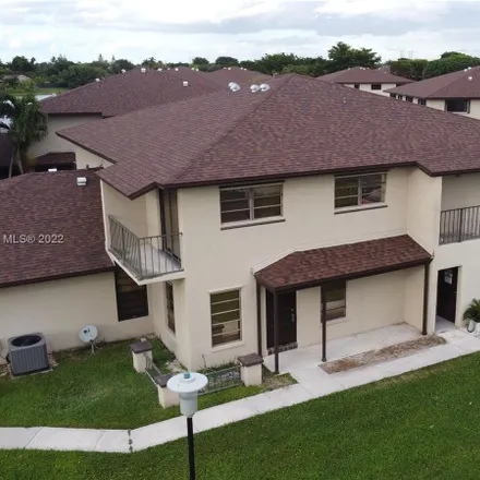 Rent this 2 bed townhouse on 13974 Southwest 46th Terrace in Miami-Dade County, FL 33175