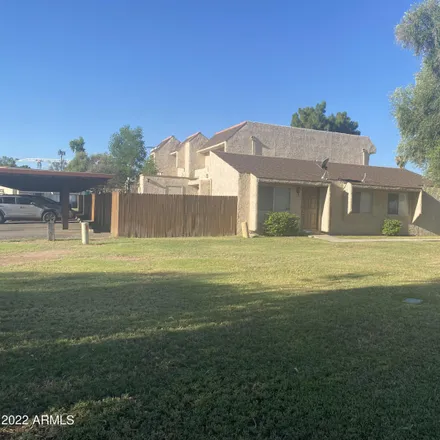 Rent this 3 bed townhouse on 2221 West Farmdale Avenue in Mesa, AZ 85202