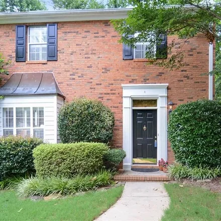 Rent this 3 bed townhouse on 1150 Windsor Parkway Northeast in Sandy Springs, GA 30319