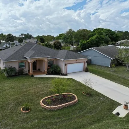 Buy this 3 bed house on 326 Albright Street Southeast in Palm Bay, FL 32909