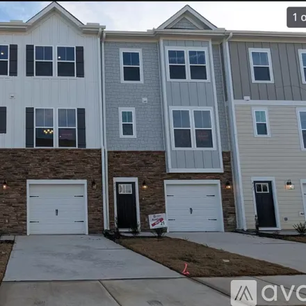 Rent this 4 bed townhouse on 823 Parc Townes Drive