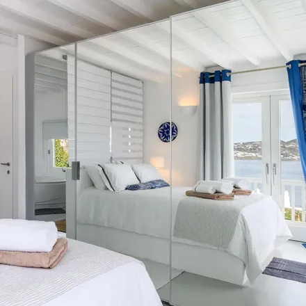 Rent this 6 bed house on National Bank of Greece in Melpos Aksioti, Mykonos