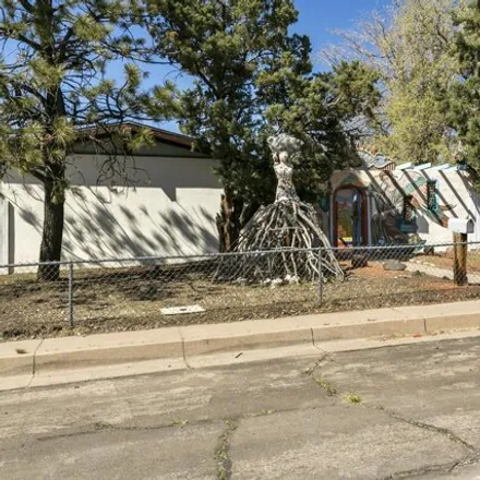 Buy this 3 bed house on 10391 Menaul Boulevard Northeast (Frontage Road) in Matheson Park, Albuquerque