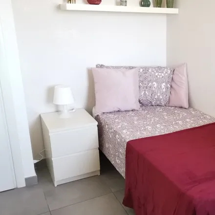 Rent this 5 bed room on Via Fabio Numerio in 20, 00181 Rome RM