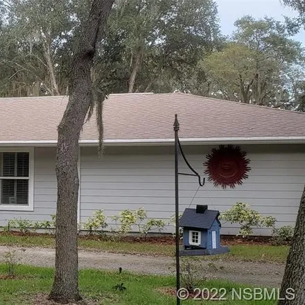 Buy this 4 bed house on 5991 Trailwood Drive in Port Orange, FL 32127