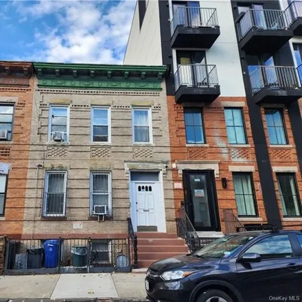 Buy this 5 bed townhouse on 231 Jackson Street in New York, NY 11211