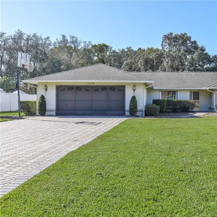 Buy this 3 bed house on 10250 Hoover Street in Spring Hill, FL 34608