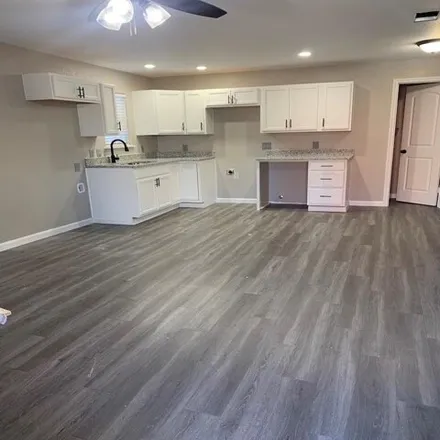 Rent this 4 bed house on 1230 Stella Street in Fort Worth, TX 76104