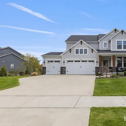 Buy this 5 bed house on 6570 Summer Meadows Drive Northeast in Cannon Township, MI 49341